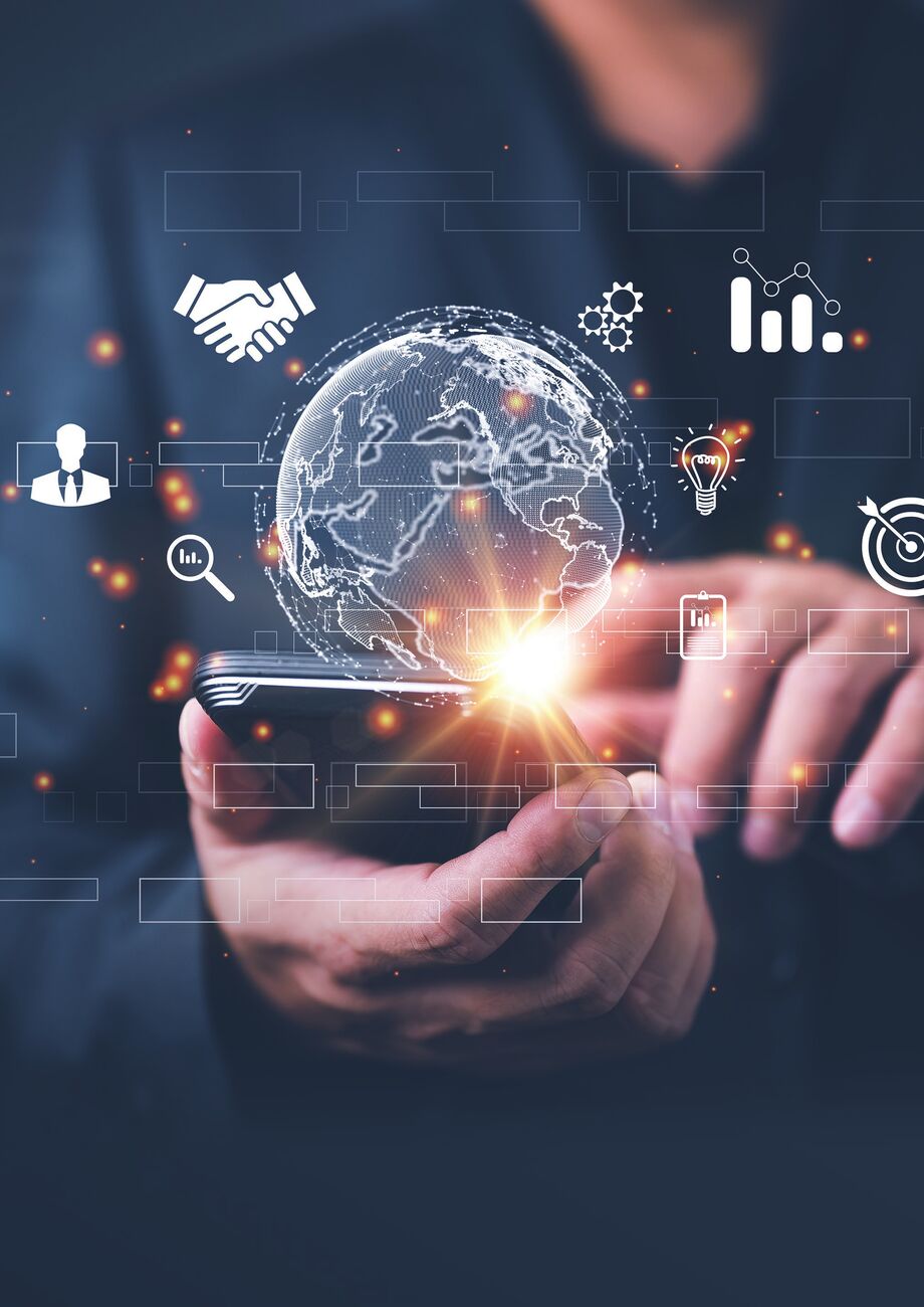 A hand holding a connected world